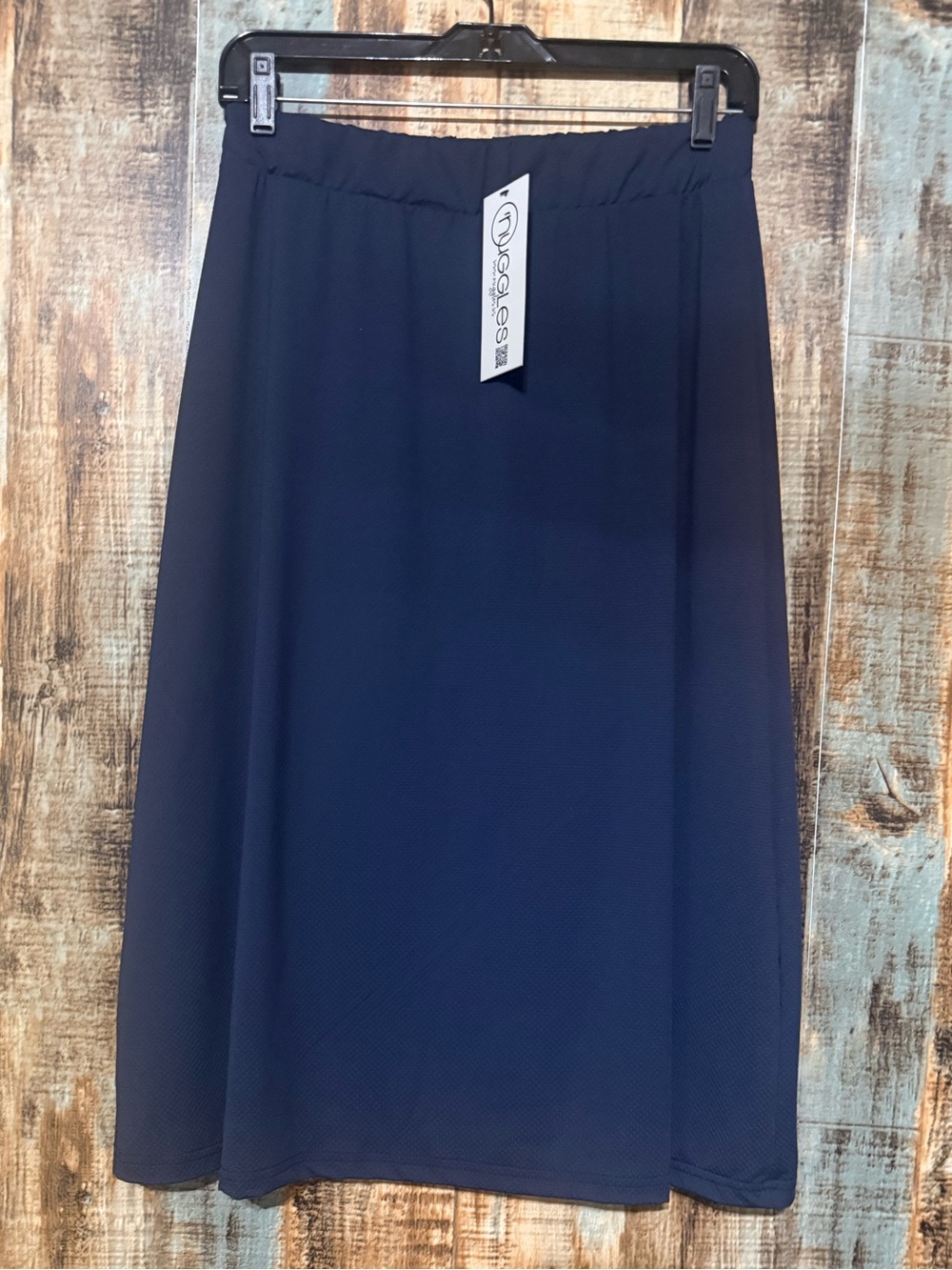 Nuggles All Sport Dark Navy Midi Skirt with leggings. NWT. Size large.